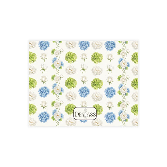 The Dakota note card detail showing blue hydrangea floral pattern.