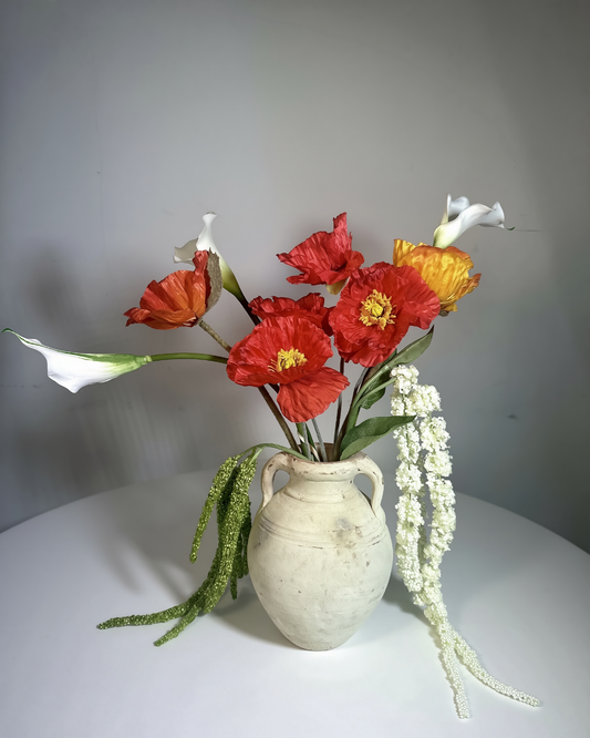 The Montauk Large — vibrant red poppy and white calla lily silk flower arrangement with trailing amaranthus in a ceramic vessel. Real-touch blooms, made to order in NYC.