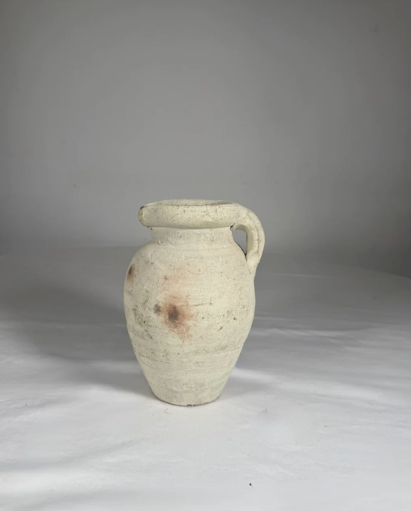 Small 8-inch terracotta bud vase from Deadass Flowers NYC, sized for a 2 to 4 stem silk bouquet.