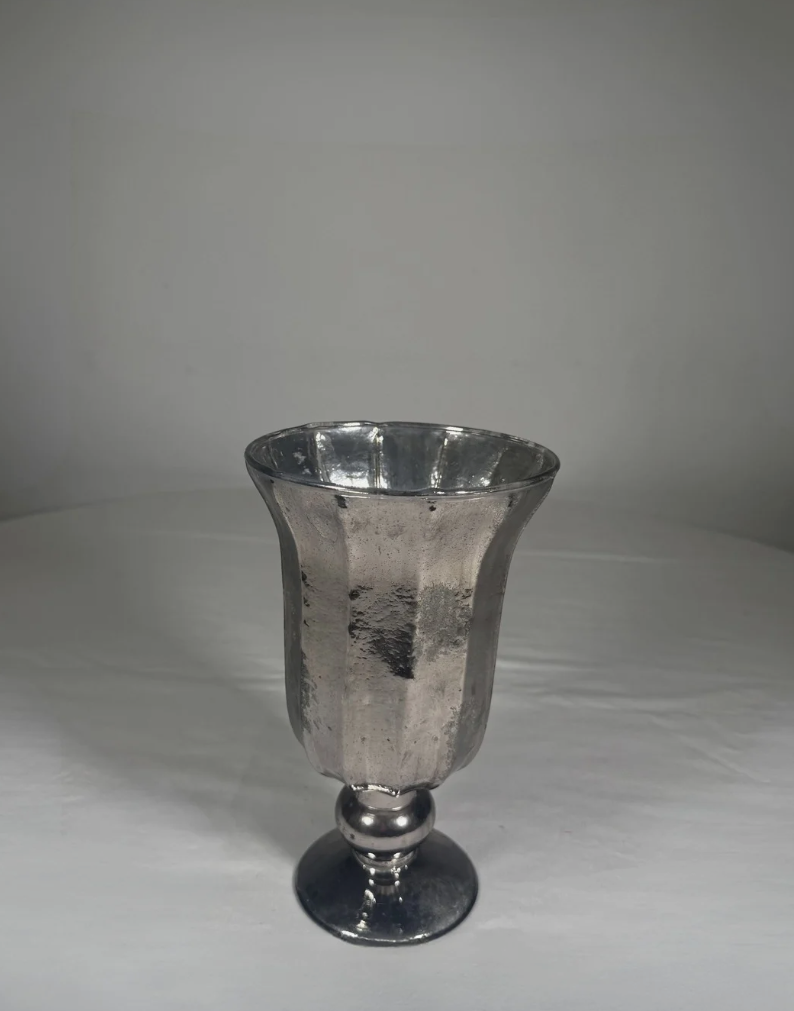 Tall 9-inch silver urn vase with a narrow mouth, sized for silk flower arrangements. Hand-picked in NYC.