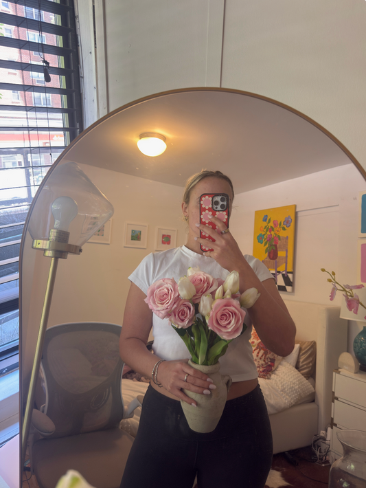 The Standard — pink garden silk roses and white tulips in a small terracotta vase. Made to order in NYC.