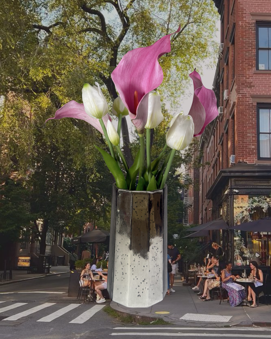 The Elizabeth silk arrangement styled in a clear glass vessel, real-touch tulips and callas.