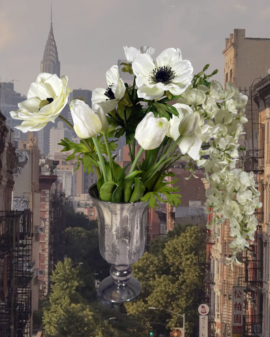 The Gramercy silk arrangement styled in a clear glass vessel.