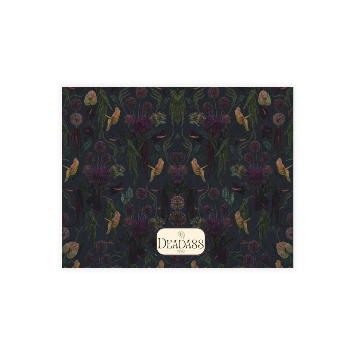 The Delancey note card detail showing dark purple anthurium floral pattern.