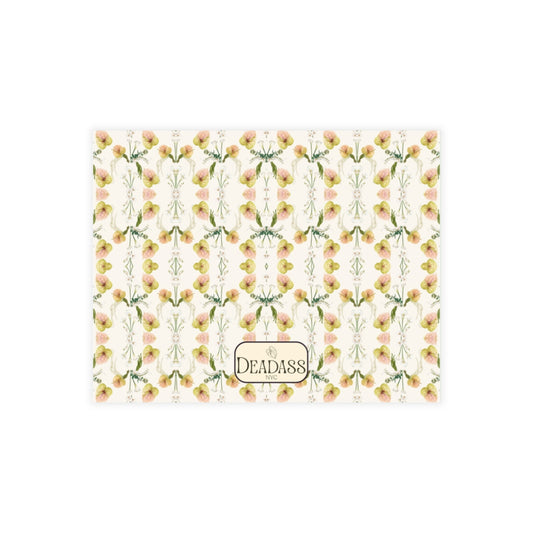 The Sara J note card detail showing white orchid and anthurium floral pattern.